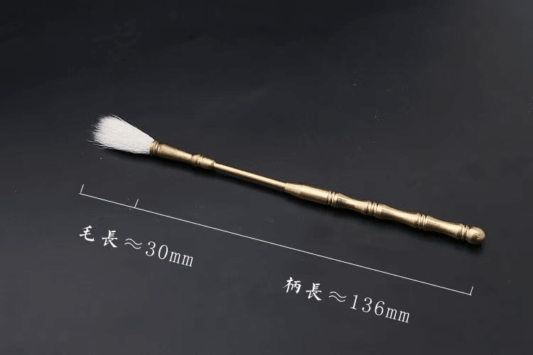 Detailed image of brass incense tool brush with cotton tip, showing dimensions of 136 mm handle and 30 mm bristle length on dark background