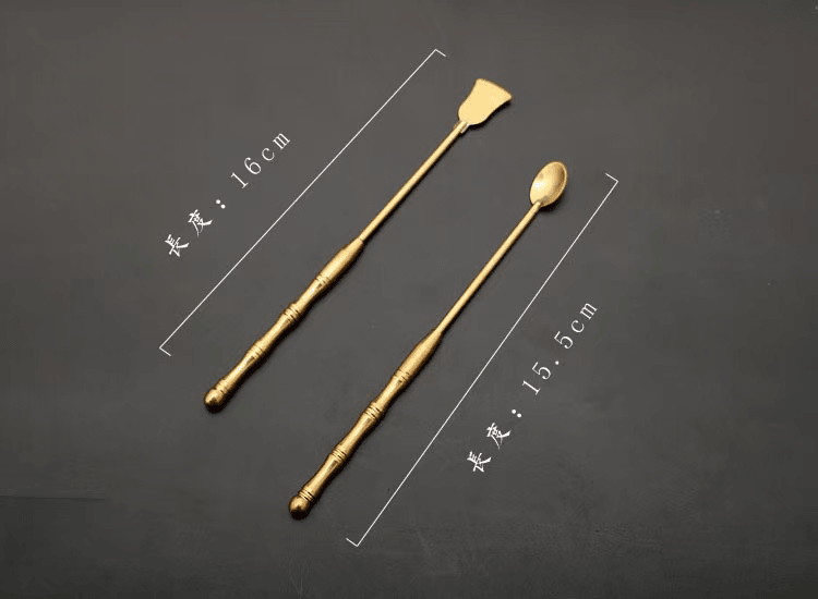 Detailed image of brass incense tool spatula and spoon, showing lengths of 16 cm and 15.5 cm respectively, on dark background