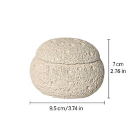 Top view of a handmade cement incense burner with dimensions labeled as 9.5 cm (3.74 in) in height and 7 cm (2.76 in) in diameter
