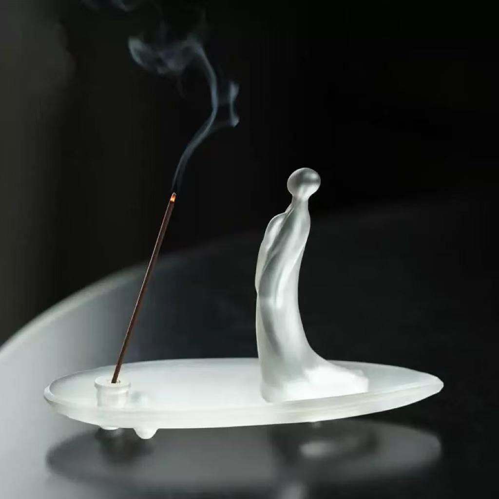 Frosted glass incense holder burning incense