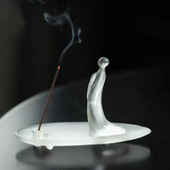 Frosted glass incense holder burning incense