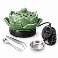 Green ceramic lotus electric incense burner with digital controller, power cord, incense dish, spoon and tweezers on a white background.