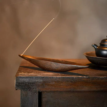 Handcrafted wooden boat-shaped incense holder