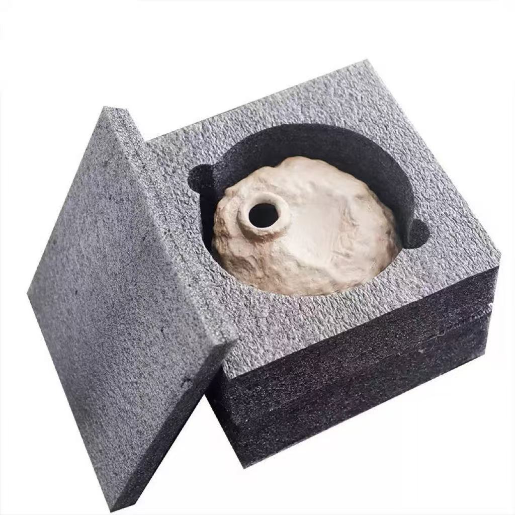 Handmade ceramic incense burner securely placed inside custom-cut foam protective packaging, showing safe shipping and premium unboxing experience
