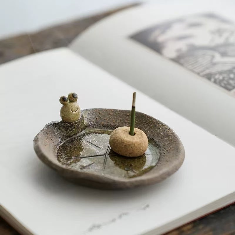 Handmade ceramic incense holder with frog figurine, artisanal incense burner for meditation, yoga, and home decoration.