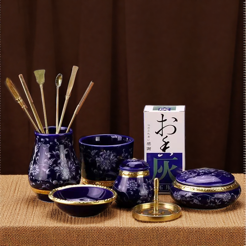 Blue porcelain incense burner ceremony set with brass tools and accessories