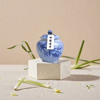 Lemongrass handcrafted natural incense powder in a blue ceramic jar, made from pure dried lemongrass.