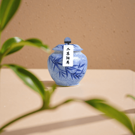 Silent Chapter natural handcrafted incense powder in a blue ceramic jar, made with jasmine, aloeswood, sandalwood, and frankincense for calming rituals and aromatherapy.