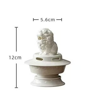 White ceramic guardian lion incense burner with size reference showing 12cm height and 5.6cm width
