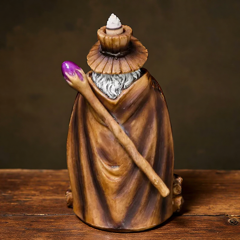 Back view of wizard backflow incense burner showing robe and staff detail