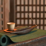 Wooden boat incense holder with tea setup